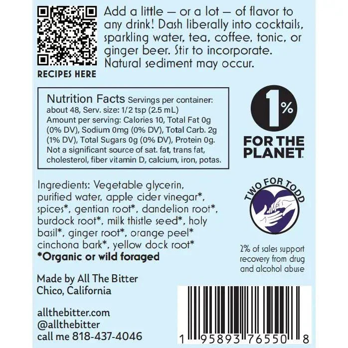 Bottle of aromatic bitters with cinnamon, nutmeg, and clove for craft cocktails and non-alcoholic drinks