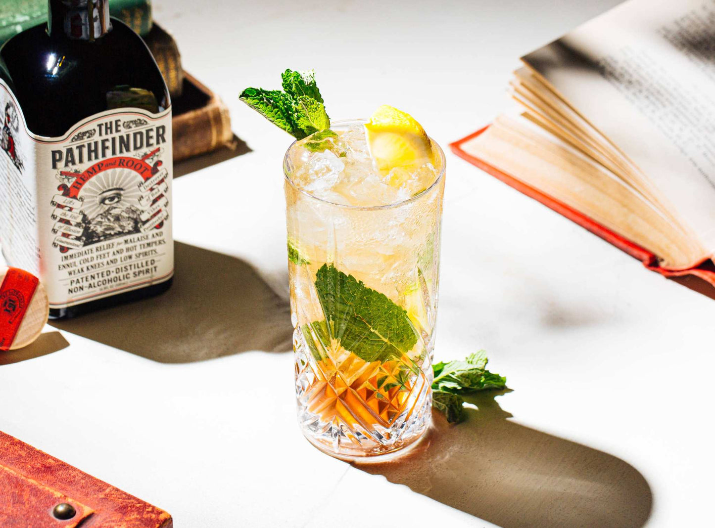 Bottle of Hemp and Root non-alcoholic spirit with herbs and natural ingredients displayed