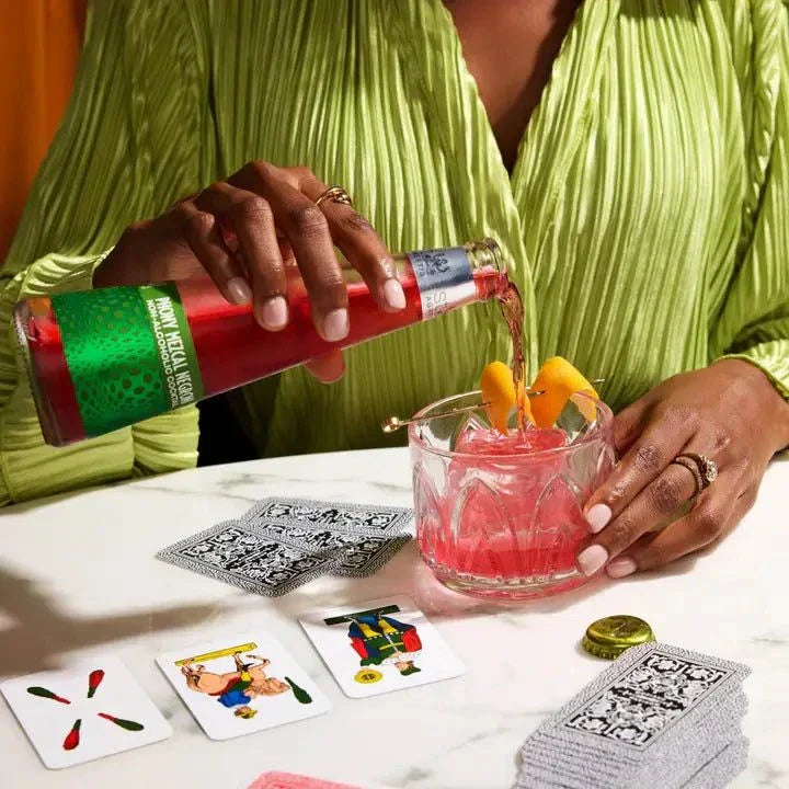 Phony Mezcal Negroni cocktail with smoky mezcal and orange twist over ice