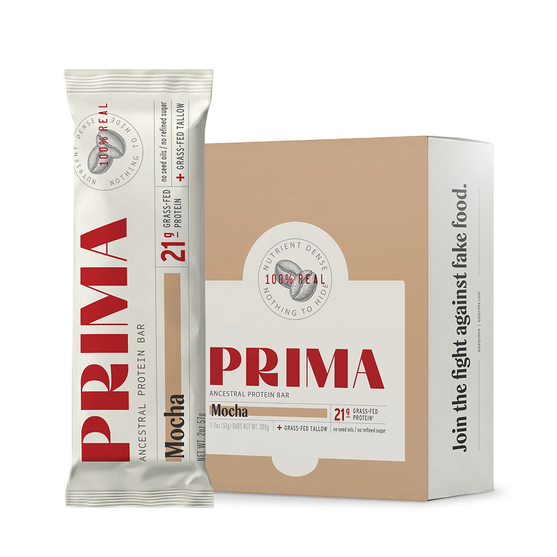 PRIMA Ancestral Protein Bar Mocha Latte flavor pack and bar displayed on wooden surface
